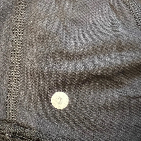 Lululemon Elevate Tank with Drawstring Hem 
Black 
Size 2
Pit to pit 13” - Picture 7 of 7